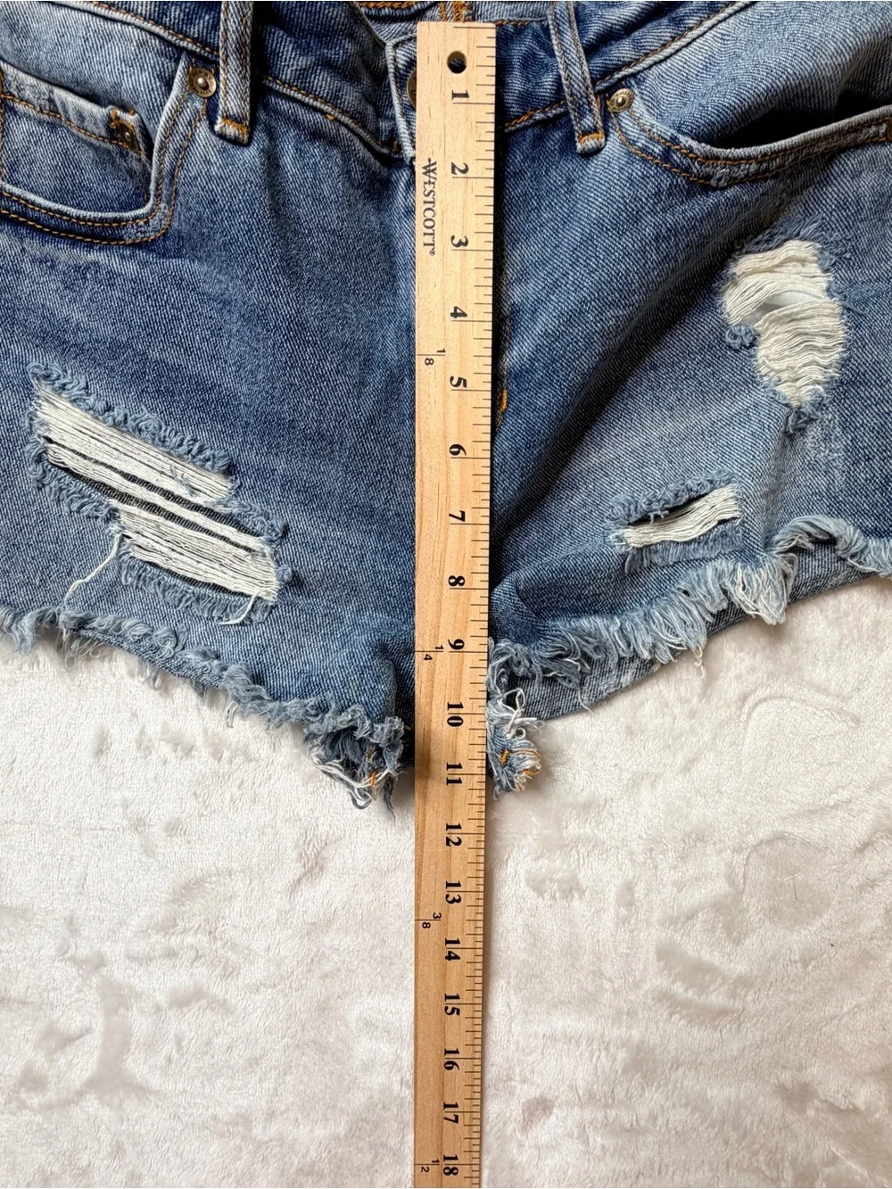BullHead denim Co. Women's Distressed Blue Denim cutoff  mid/high rise Shorts.